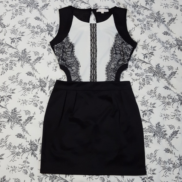 VintyGOGO Dresses & Skirts - Very Sexy high neck mini dress with cut outs